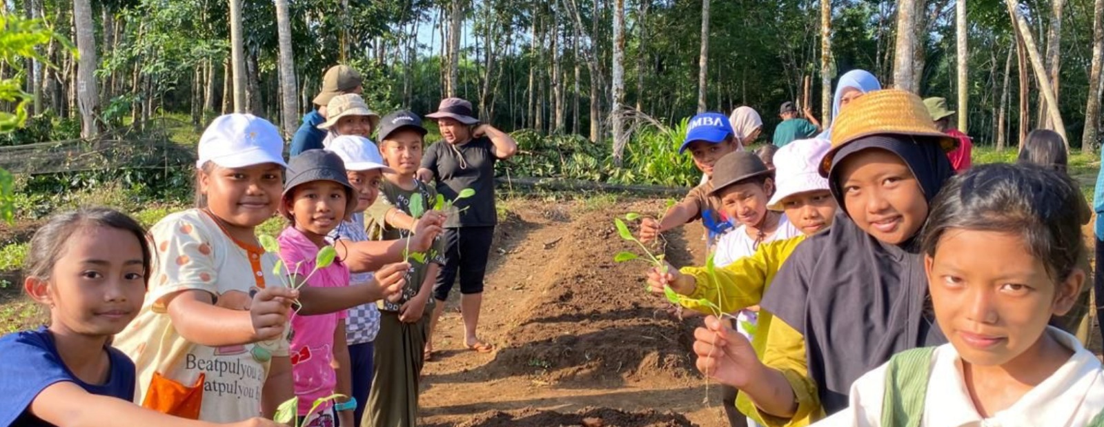 students participating in tree planting